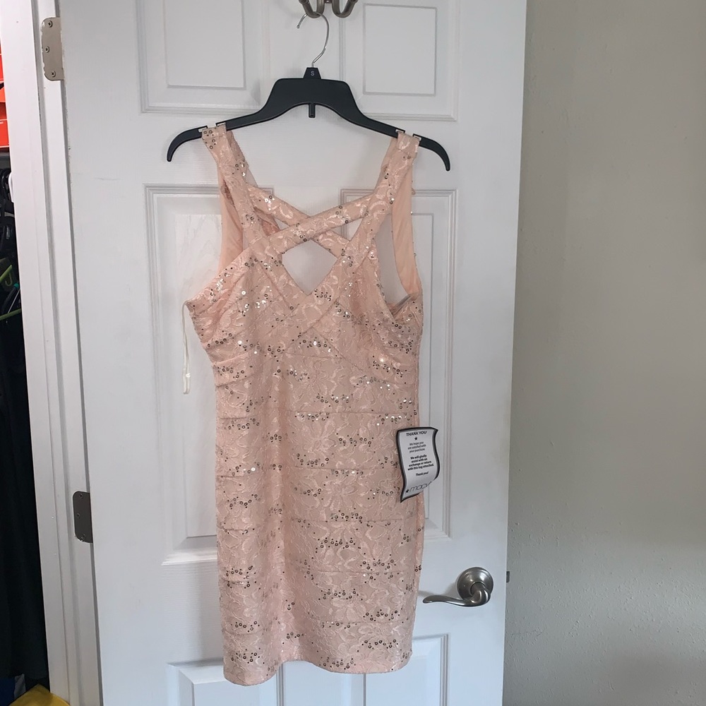 New with tags pink with silver sequin Juniors M